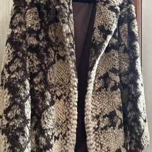 Unreal fur snakeskin faux fur coat. Women’s size XL.